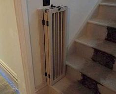 a radiator sitting on the side of a stair case next to a set of stairs