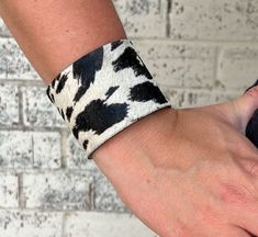 Don't moooooove- brighten up your look with The Clarabelle Headband! Crafted from black and white cowhide, this headband is a stylish way to add a bit of bovine brilliance to any outfit. It's moo-tivational! width: 1.5" Arm Band, Cuff Bracelet, Favorite Jewelry, Cuff Bracelets, Etsy Accessories, Jewelry Bracelets, Bathing Beauties, Cuff, Electronic Accessories