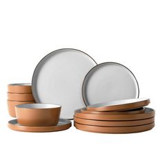 an image of a set of dinner plates and cups