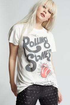 The Rolling Stones is a legendary band that has been making rock music and influencing pop culture since the early 1960s. This vintage style tee features authentic concert graphics with the band's iconic red lips and tongue logo. Made with soft cotton fabric, a ribbed crew neckline, short sleeves, and a classic t-shirt fit. Details Style #302510 Color: White The Rolling Stones Concert Bus Trip Unisex T-Shirt 100% Cotton Care/Import Machine Wash Cold, Tumble Dry Low Designed and Finished in Los A Rolling Stones Tshirt, Rolling Stones Concert, Bus Trip, Travel Tees, Bus Travel, Fit Details, Red Lips, Rolling Stones, Rock Music