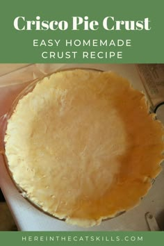 a person holding a pie crust in their hand with the words crisco pie crust easy homemade crust recipe