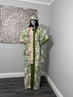 African/Nigeria bubu brocade outfit. One size. Small sized scarf. Oversized,And  Please note measurements: Width: 64inches Lenght: 62inches Bohemian Green Short Sleeve Set, Green Bohemian Short Sleeve Set, Long Bohemian Green Sets, Green Bohemian Long Sets, Traditional Green Long Agbada, Traditional Long Green Agbada, Traditional One-size Shawl Kimono, Traditional One Size Shawl Kimono, Traditional Long Agbada Free Size