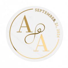 a white and gold wedding sticker with the letter a in it's center