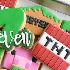 some cookies that are decorated to look like they have the word eleven on them,