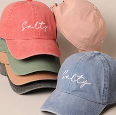 Elevate your casual style with our Salty Hat embroidered hat. This cap features a sleek and playful "Salty" embroidery, perfect for those who embrace their edgy side. Made from premium materials, it ensures a comfortable fit and long-lasting wear. Whether you're hitting the beach, running errands, or hanging out with friends, the Salty Hat adds a touch of attitude to any outfit. Stay cool, stylish, and effortlessly chic with this must-have accessory. It's the perfect complement to a bad hair day!  FEATURES: >100% Cotton Twill >Pigment dyed, garment washed, low profile, six panel >Leather strap, antique brass grommet and buckle >Four rows of stitching on self-fabric sweatband >Dyed to match cotton taping >Preformed bill, sewn eyelets >Adams exclusive Cool-Crown mesh in coordinating colors. Baseball Cap Embroidery, Womens Ball Caps, Cap Embroidery, Embroidery Caps, Embroidery Baseball, Trendy Hat, Personalized Baseballs, Fashion Cap, Embroidered Hat