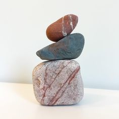 three rocks stacked on top of each other