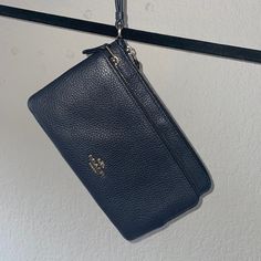 Basically Brand New, Navy Coach Wristlet With Two Pockets To Fit Cards And Other Misc Stuff. Great Condition. 8.5” X 5” Elegant Blue Clutch With Zipper Closure, Blue Elegant Wristlet For Everyday Use, Elegant Blue Pouch Wristlet, Elegant Blue Wristlet For Everyday Use, Bike Messenger Bags, Bag Pins, Brown Tote, Red Handbag, Coach Wristlet