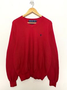 This sweater remains in pre owned condition. Measurements  Pit to pit: 24 inches Top to bottom: 26 inches Classic Red V-neck Long Sleeve Sweater, Casual Red Polo Sweater For Winter, Red Pullover Sweater, Mens Pullover, Red Pullover, Polo Golf, Pullover Men, Cotton Knit, Pullover Sweater