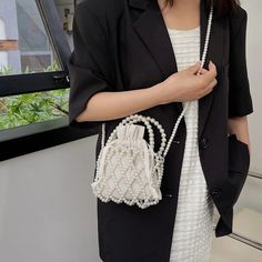 Women Pearl Bag Small Mini Tote Bucket Bag Woven Crossbody Hand Bags for Women Coin Purse Wallet Handbag Ladies Shoulder Bags SPECIFICATIONS Lining Material: Polyester Main Material: ABS Shape: Bucket Decoration: PEARL Hardness: Moderate Gender: WOMEN Pattern Type: hollow out Occasion: Versatile Interior: No Pocket Model Number: Shoulder Bag Closure Type: string Shape: Bucket Main Material: ABS Lining Material: Polyester Decoration: PEARL Department: WOMEN Pattern Type: Hollow Out Closure Type: STRING Hardness: Moderate Mini Bag: Pearl Bag Hand Bags: Bags for Women Coin Purse: Handbag [New20240528] Double Handle Shoulder Bag With Pearl Handle, Chic Shoulder Bag With Pearl Handle And Pouch Shape, Double Handle Shoulder Bag With Pearl For Shopping, Bucket Bag With Pearl Handle, White Woven Pouch-shaped Bucket Bag, Bucket Tote Bag, Hand Bags For Women, Coin Purse Wallet, Pearl Bag