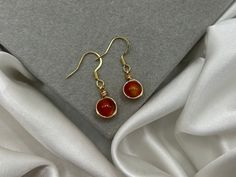 Save when you shop through my website, I'd appreciate it 💚- https://shorturl.at/dGU49 *PLEASE NOTE:  The picture displayed is for reference. Please be advised your chosen crystals will vary slightly. However, they will be equally as beautiful & powerful* 💓 Lovingly Handmade tarnish resistant carnelian drop earrings 💓 Benefits of Carnelian 🧡 🧡 Fill your life with passion, creativity and confidence.  🧡 The crystal of creativity, Carnelian's fiery energy also brings passion and self-confidence. 🧡 This crystal will bring you that creative spark, igniting your wildest dreams and giving you the confidence to make them come true.  🧡 Be taken out of your head and connect with your heart centre. 🧡 You are worthy of the world, and through inspiring your spirit, this crystal will remind you Thrift Clothes, Carnelian Earrings, Handmade Jewelry Gift, Earrings Dainty, July Birthstone, Drop Earring, Healing Crystal, Charm Earrings, Self Confidence