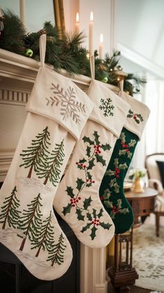 two christmas stockings hanging from a mantel