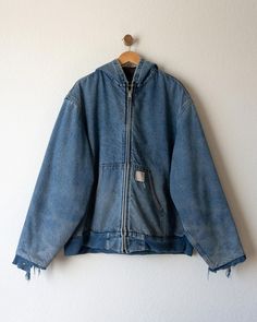 Thrashed Vintage Carhartt Flannel Lined Hooded Denim Jacket 1980s era, super sick wash to the denim, thick flannel lining to keep you warm, worn by ASAP Rocky so it has some hype to it, made in usa, thrashed sleeves. These are hard to comeby especially in XL! Might even be 2XL go by measurements! Item is sold as is. Jacket has minor staining on the back hard to see but up-close its there, was only able to see it in one area. Jacket also has thrashed/ distressed sleeves. Measurements Chest: 30.25 Vintage Hooded Denim Outerwear, Rugged Denim Jacket For Winter Streetwear, Rugged Winter Denim Jacket For Streetwear, Winter Rugged Denim Jacket For Streetwear, Vintage Cotton Hooded Jacket, Carhartt Denim Jacket, Carhartt Flannel, Levi Denim Jacket, Dress Better