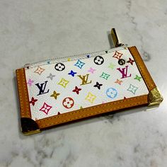 Authentic Louis Vuitton Monogram Murakami Multicolor Coin Cles Bag. Brand New. Never Used. In Perfect Condition With Zero Wear Or Blemishes. Rare Htf Piece. Designer White Bags With Card Slots, White Designer Bag With Card Slots, Luxury White Wallet For Travel, Designer White Travel Wallet, Luxury White Travel Wallet, Luxury Multicolor Wallets For Travel, Designer Multicolor Travel Wallet, Luxury Multicolor Wallet For Daily Use, Luxury Multicolor Wallets With Card Slots