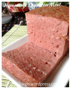 a close up of a meatloaf on a plate with the words homemade european meat