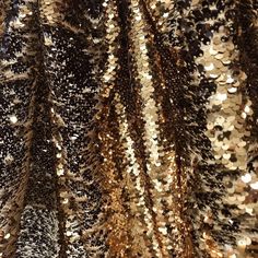 Glamorous Stretch Contrast Sequin Fabric, Glamorous Stretch Sequin Fabric With Contrast Sequins, Glamorous Gold Sequin Fabric With Glitter Print, Gold Sequin Fabric With Glitter Print For Glamorous Looks, Metallic Sequin Fabric For Night Out, Glamorous Metallic Sequin Fabric, Glamorous Metallic Shiny Sequin Fabric, Glamorous Metallic Sequin Fabric With Glitter, Stretch Glamorous Sequin Fabric