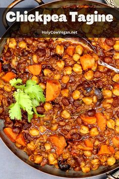 chickpea tagine with carrots and cilantro in a skillet