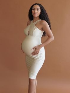 The Mimi Dress is available in two stunning colors, this dress is a light weight stretch fabric with a sheen finish. Our model is wearing a Large Black Pregnancy, Maternity Fashion Dresses, Lace Maternity Gown, Cute Maternity Dresses, Mimi Dress, Maternity Photoshoot Outfits, Pregnancy Goals, Beautiful Pregnancy, Preggo Fashion