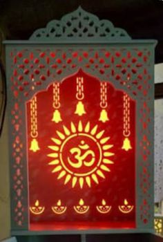 a lit up sign with an om symbol on it