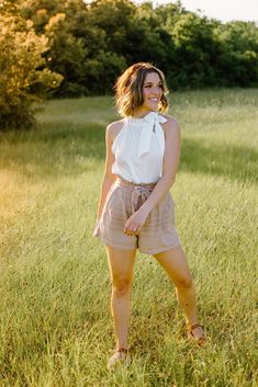 Beige Don't Make Plans Shorts Make some plans because this easy pair of shorts will be your go-to favorite! The Beige Don't Make Plans Shorts are so comfy and cute with that bit of ruffle at the waist and the wide tie belt - it's not attached, so you can remove it. They run true to size but fit loosely and are super high waisted. There's two pleats at the front and two pockets that are big enough for your phone, lip gloss and hair clip too! The fabric has a soft, tweedy look and it is all fully Tie Belt, Hair Clip, Lip Gloss, Hair Clips, High Waisted, Running, How To Plan, Hair, Fabric