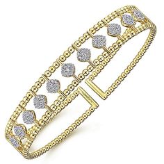 Gabriel Bujukan 14K Yellow & White Two-Tone Gold Pave Diamond Flexible Bangle Bracelet Featuring 0.67 Carats Total Weight Round Cut Diamonds with High Polished Bead Edging Diamonds are SI clarity and G/H color- 99 diamonds in bracelet Bracelet measures approximately 3/8th inches wide (just under 1/2 an inch) Includes bracelet box Includes jewelry appraisal Free expedited shipping on this item Ships fully insured to point of delivery Bead Edging, Diamond Bangle Bracelet, Bracelet Box, Jewelry Appraisal, Diamond Bangles Bracelet, Diamond Bangle, G H, Round Cut Diamond, Pave Diamonds