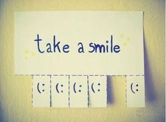 a sign that says take a smile on it