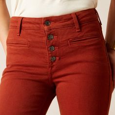 This modern high-rise crop with a kick-flare and an exposed button-front can be dressed up or down. Featuring a rich dyed denim and front welt pockets make it a go-to fun jean. Ariat High Rise Kick Flare Jeans Raw Hem Color - Brick Features a seat that won't sag and waistband that won't gap Slim through hip & thigh 10" Front Rise Inseam 27" (size 25) 10 oz Ring-Spun denim 92% Cotton 6% Polyester 2% Elastane Chic High-waist Cotton Flare Jeans, Relaxed Fit High-waisted Flare Jeans With Pockets, High-rise Flare Denim Jeans With Button Zip Fly, Jeans Raw Hem, Stretch High-rise Flare Jeans With Button Closure, Affordable Button-detail Flare Jeans, Dyed Denim, Kick Flare Jeans, Kick Flares