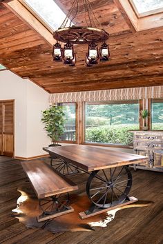 a large wooden table sitting in the middle of a room