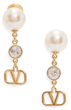 These gorgeous drop earrings add a touch of sophisticated movement to your look with imitation-pearl studs suspending a chain with crystal and VLOGO accents. Post back Goldtone plate/imitation pearl/crystal Made in Italy Pearl Crystal, Ear Rings, Crystal Drop Earrings, Crystal Drop, Pearl Studs, Valentino Garavani, Gold Tones, Pearl Earrings, Nordstrom