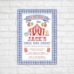 a circus birthday party poster on a brick wall