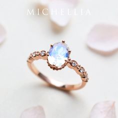 "Our current turnaround time for regular orders is 6-8 weeks. For urgent orders, please shop our Ready-to-Ship collection below (7-10 business days): https://michellia.com/collections/ready-to-ship (please copy and paste into browser) -------- 「Evelina」- Vintage Inspired Oval Ring, in Rainbow Moonstone | R5001 A classic style with a refined silhouette, Evelina features an elegant oval center set in a vintage-inspired crown setting. The timeless oval shape is accentuated by the thoughtful details Luxury Oval Moonstone Promise Ring, Luxury Oval Moonstone Wedding Ring, Rose Gold Moonstone Ring, Gold Moonstone Ring, Oval Cut Ring, Moonstone Engagement, Engagement Ring Vintage, Moonstone Engagement Ring, Rose Gold Wedding Bands