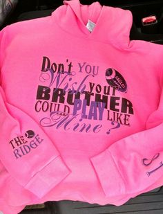 a pink sweatshirt that says don't you like your brother could play like me