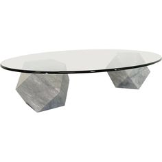 a glass and marble coffee table with geometric shapes on the top, against a white background