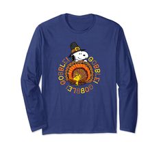 a blue long sleeve shirt with a dog wearing a pilgrim hat and holding a turkey