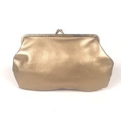 "-Gold faux leather change purse -Snap closure -7\"x 4 1/4\"" Classic Gold Wallets For Evening, Formal Gold Wallets With Gold-tone Hardware, Formal Gold Wallet With Gold-tone Hardware, Classic Gold Pouch Bag, Classic Clutch With Gold-tone Hardware As Gift, Classic Rectangular Party Wallets, Gold Clutch Wallet With Gold-tone Hardware, Gold Leather Pouch Clutch, Classic Gold Evening Bag With Removable Pouch