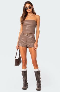 Faux-leather composition puts a contemporary spin on these sleek high-waist shorts. Zip fly with button closure Front scoop pockets; back patch pockets 100% polyester with polyurethane coating Hand wash, dry flat Imported Leather Tube Top, Visionary Fashion, Faux Leather Shorts, Swimwear Dress, Active Leggings, Leather Shorts, Matching Top, Bottom Clothes, S Models