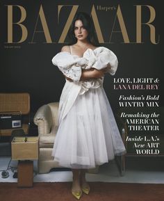 a woman in a white dress on the cover of harper harper's harper magazine