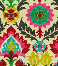 a colorful floral design on white fabric