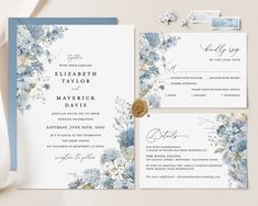 wedding stationery with blue flowers and wax stamp