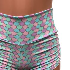 Sexier and more flattering! Our classic booty shorts made in pastel mermaid print spandex with ruching on each side. Made to flatter your figure and move with you. The standard inseam is 2.5" - but can be customized. Choose between low-rise, mid-rise and high-waist (high-waist shown in photos). Fitted Pink Short Swim Trunks, Multicolor Fitted Short Swim Trunks, Fitted Multicolor Swim Trunks, Multicolor Stretch Swim Trunks, Fitted Swim Trunks With Built-in Shorts For Spring, Summer Stretch Mermaid Bottoms, Fitted Green Mermaid Bottoms, Fitted Multicolor Swimwear With Elastic Waistband, Girlfriend Clothes