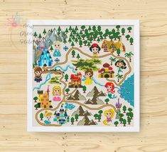 a cross stitch pattern with princesses and castles on it, in the shape of a map