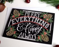 a christmas card with the words merry everything and happy always on it, surrounded by pine cones