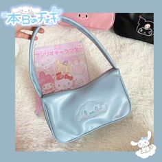 Closure: zipper buckle Popular element: embroidery Style: shoulder bag/handbag Fashion style name: Tote bag Size: length: 26cm heigth: 16cm width: 8cm Please note: 1.Don't hold it in your mouth or eat it! 2.Due to hand measure, the size may have 1-2 cm error. 3.Due to lighting effects, monitors brightness, contrast settings and etc, there could be some slight differences in the color tone of the pictures and the actual item. Different batch colors will vary. Blue Cinnamoroll, Black Kuromi, Pink Melody, Hello Kitty Handbags, Kawaii Y2k, Y2k Girl, Melody Hello Kitty, Artificial Leather, Fashion Handbags