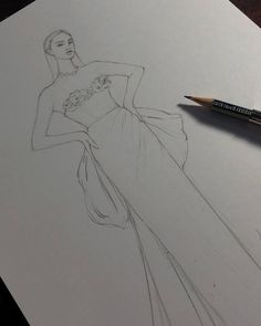 a pencil drawing of a woman in a dress