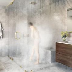 a blurry image of a man in the shower