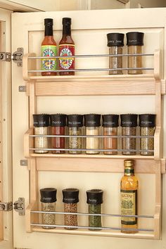 spice rack with spices and seasonings in it