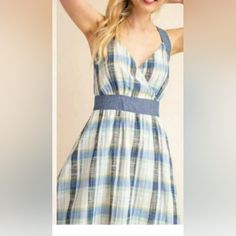 This Gilli Dress Is A Stunning Addition To Any Wardrobe. The Sleeveless, Racerback Design Features A V-Neckline And Hidden Side Zipper For A Perfect Fit. This Dress Is Lined. The Blue Plaid Pattern And Colorful Theme Make It Perfect For Summer And Spring Occasions Of Your Choice. Ptp Aprox 19" Length Aprox 35" Add This Gilli Criss Cross Plaid Blue Flare Dress To Your Collection Today! Blue Sleeveless Dress For Picnic, Cotton V-neck Dress For Picnic, Blue Sundress Midi Dress For Picnic, Blue V-neck Sleeveless Cotton Dress, Blue Cotton Midi Dress For Picnic, Blue Sleeveless Mini Dress For Picnic, Side Zipper, Blue Plaid, Criss Cross