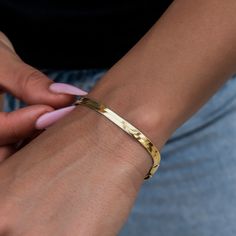 Introducing the Herringbone Bracelet- 4mm in 18k Yellow Gold! This sleek bracelet is sure to become your next staple piece adding just enough style and simplicity to any look. Featuring a classic herringbone pattern, this piece reflects light from every angle and complete with our signature 'G' clasp. Rock it solo, or pair it with the Herringbone Necklace in Yellow Gold for a matching set! This product is guaranteed for life – GLD will repair or replace the item should you experience any defects Yellow Gold Tarnish Resistant Name Bangle, Tarnish Resistant Yellow Gold Name Bangle Bracelet, Minimalist Yellow Gold Name Bangle Bracelet, Minimalist Yellow Gold Bangle Name Bracelet, Tarnish Resistant Gold Bangle For Everyday Luxury, Minimalist Tarnish Resistant Name Bangle Bracelet, Herringbone Bracelet, Herringbone Necklace, Vermeil Jewelry