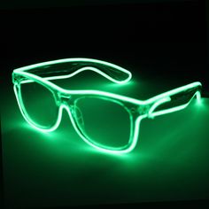 Stand out with these clear light up Wayfarer glasses with a sound activated battery pack! Material: The glasses are made of a plastic material. The el wire is security tacked onto each pair of glasses and the armbands for a durable lifespan. Wayfarer Glasses Color: Clear El Wire Color: Green with 4 modes: on, blinking, sound activated and off. Battery Pack: The small AAA battery pack is 4”L x 1”H attached to a 38” wire to place the battery pack comfortably. Battery Type: These glasses take 2 AAA Glowing Glasses, Rave Hats, Bachelorette Accessories, Wayfarer Glasses, Neon Noir, El Wire, Felt Cowboy Hats, Blue Glasses, Clear Glasses