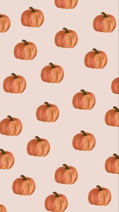 an orange pumpkin pattern on a pink background