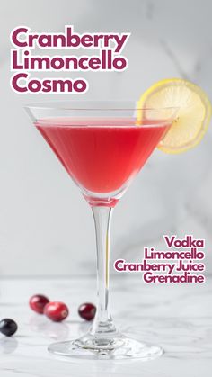 the cranberry limonocelo cosmo cocktail is garnished with cherries